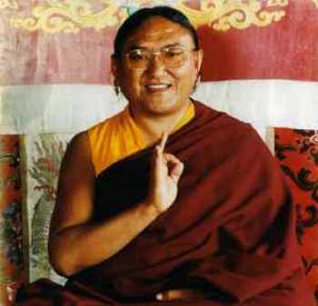 His Holiness performing a sacred blessing mudra